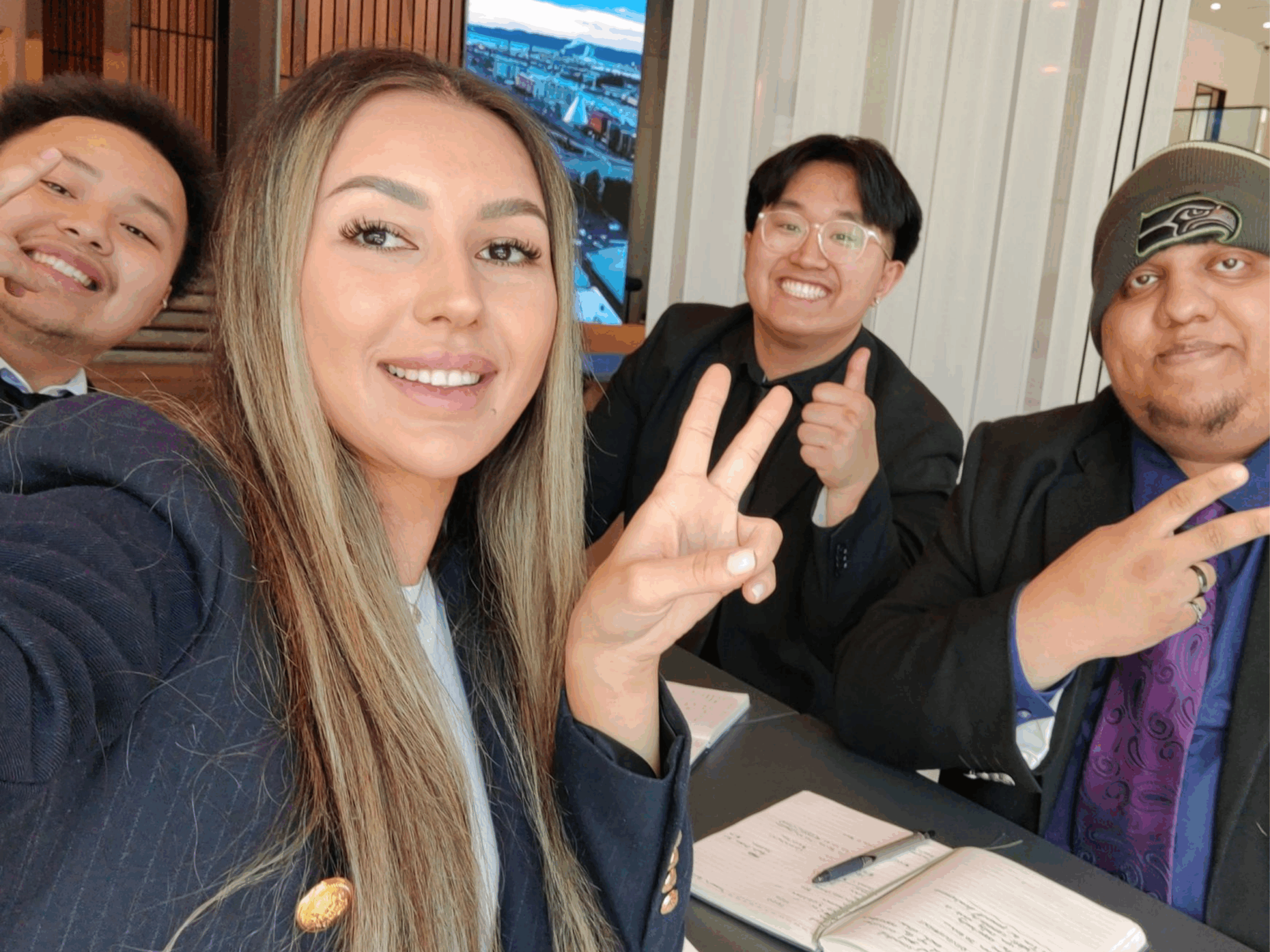 A team of business development representatives smiling